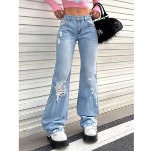 Ripped Washed Flare Leg Jeans